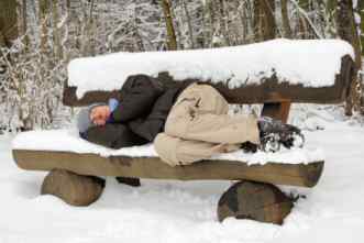 Chronic Fatique Syndrome - Man asleep on a snowy bench