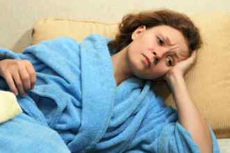 Chronic Fatique Syndrome - Woman exhausted in bathrobe