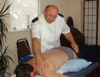 Phil at work giving a Spinal Touch treatment