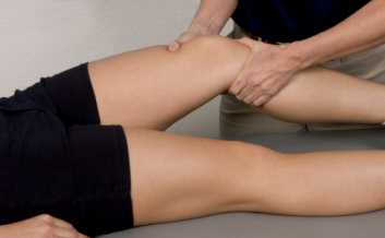 Sports massage on an athletes knee