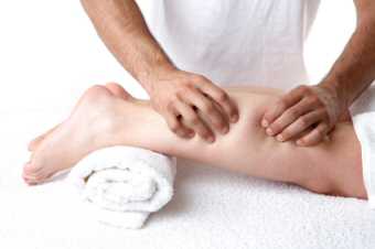 Sports massage to repair a damaged calf muscle